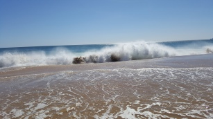 Waves crashing on Alvor South beach