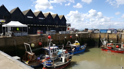 Whitstable Harbour and whelk stores in the background